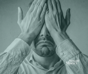 Person feeling frustrated during the process of making financial changes